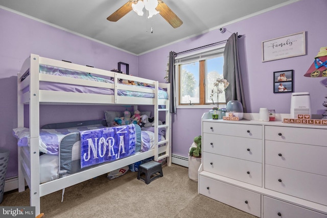 35 Long Loop Rd, Levittown, PA 19056 - bedroom with carpet flooring, crown molding, a baseboard heating unit, and ceiling fan