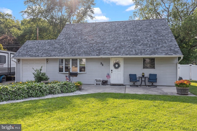 35 Long Loop Rd, Levittown, PA 19056 - view of front of property with roof with shingles, a garage, and a patio area