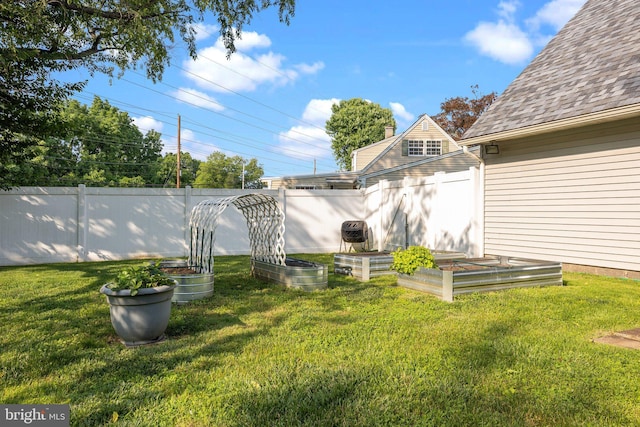 35 Long Loop Rd, Levittown, PA 19056 - view of yard with a vegetable garden