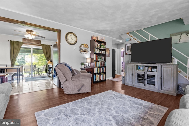 35 Long Loop Rd, Levittown, PA 19056 - living area with wood finished floors, a ceiling fan, and stairway