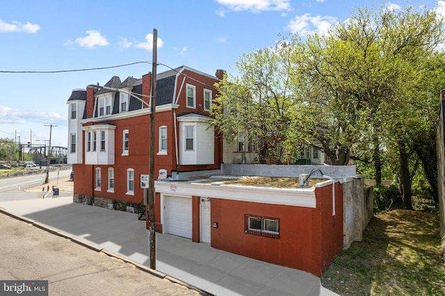 1718 N 55th St, Philadelphia, PA 19131 - view of front facade featuring a garage