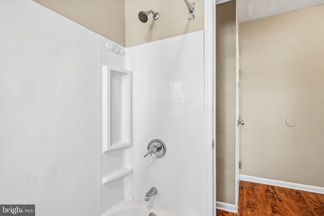 1718 N 55th St, Philadelphia, PA 19131 - full bath featuring bathing tub / shower combination, wood finished floors, and baseboards