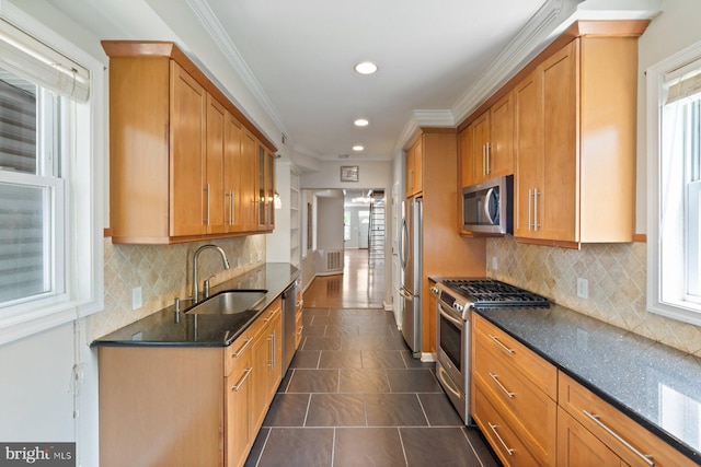 816 S Milton Ave, Baltimore, MD 21224 - kitchen with appliances with stainless steel finishes, a sink, recessed lighting, crown molding, and plenty of natural light