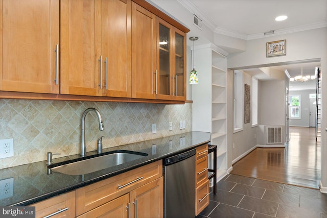 816 S Milton Ave, Baltimore, MD 21224 - kitchen with stainless steel dishwasher, a sink, crown molding, dark stone countertops, and dark tile patterned floors