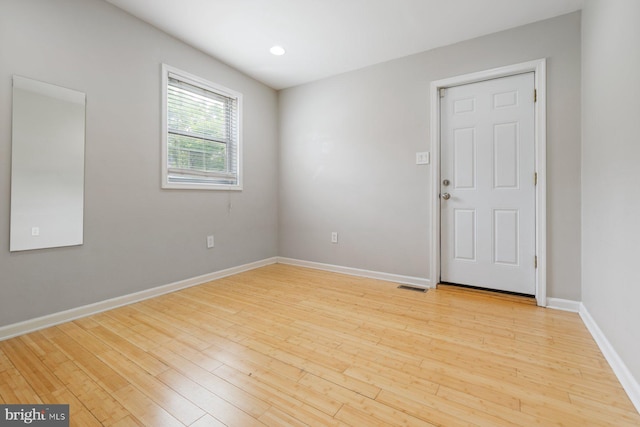 816 S Milton Ave, Baltimore, MD 21224 - unfurnished room featuring light wood-type flooring and baseboards