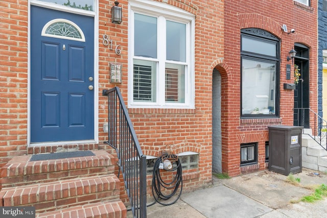 816 S Milton Ave, Baltimore, MD 21224 - doorway to property with brick siding