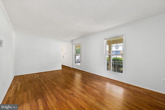 8321 Terra Grande Ave, Springfield, VA 22153 - unfurnished room featuring wood finished floors and crown molding