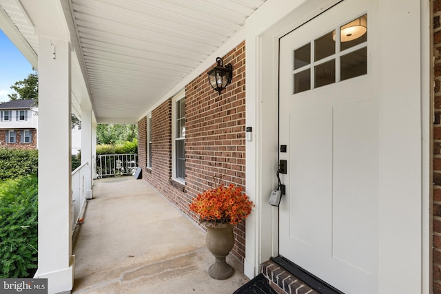 8321 Terra Grande Ave, Springfield, VA 22153 - entrance to property featuring covered porch and brick siding