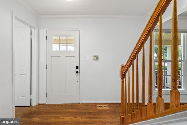 8321 Terra Grande Ave, Springfield, VA 22153 - foyer with wood finished floors, stairway, crown molding, and baseboards