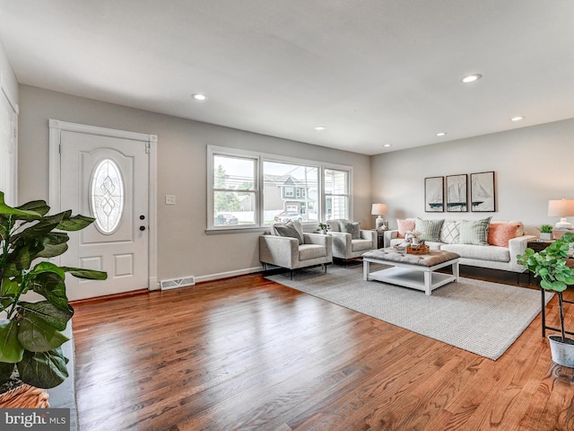 2411 Ruth Ave, Sparrows Point, MD 21219 - living area featuring wood finished floors, recessed lighting, and baseboards