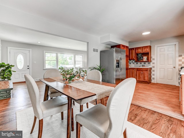 2411 Ruth Ave, Sparrows Point, MD 21219 - dining area featuring light wood-style floors and recessed lighting