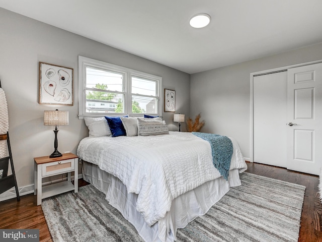 2411 Ruth Ave, Sparrows Point, MD 21219 - bedroom featuring wood finished floors, a closet, and baseboards