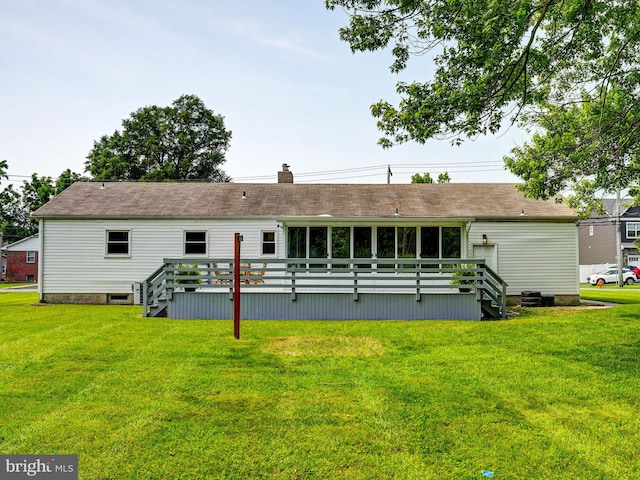 2411 Ruth Ave, Sparrows Point, MD 21219 - rear view of property with a wooden deck, a yard, and a chimney