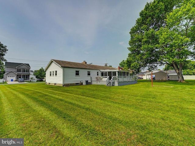 2411 Ruth Ave, Sparrows Point, MD 21219 - rear view of property featuring a yard and a chimney