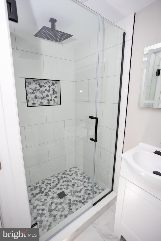 2127 Sigel St, Philadelphia, PA 19145 - full bath with a shower stall, vanity, and marble look tile flooring