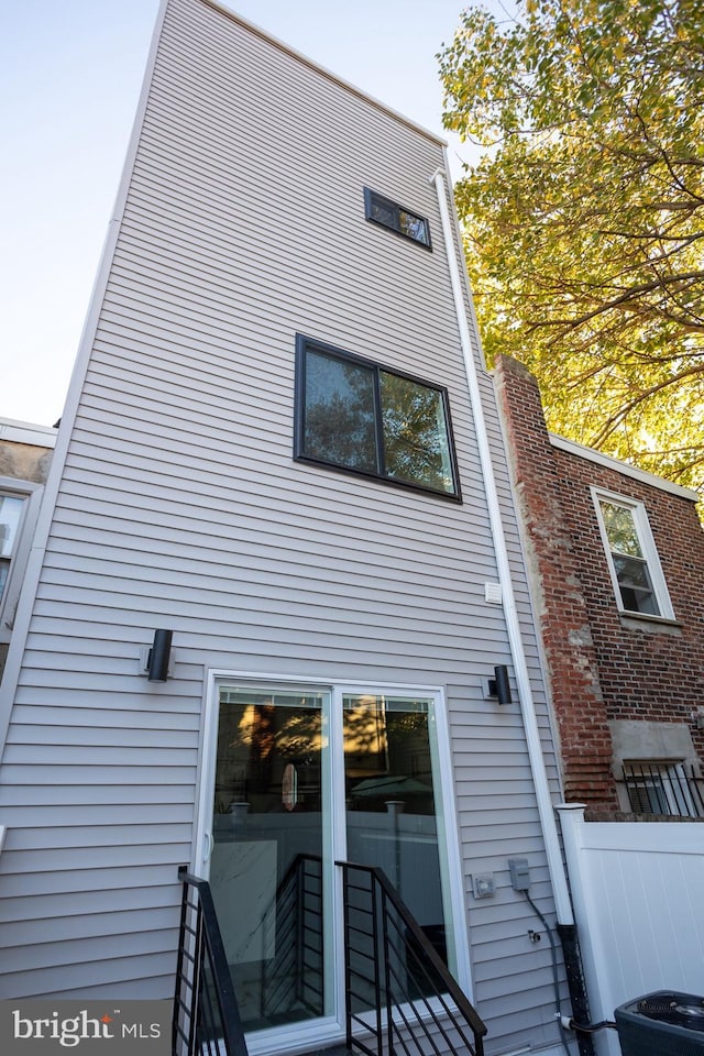 2127 Sigel St, Philadelphia, PA 19145 - back of house featuring central air condition unit