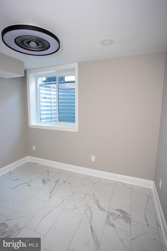 2127 Sigel St, Philadelphia, PA 19145 - empty room featuring baseboards and marble finish flooring