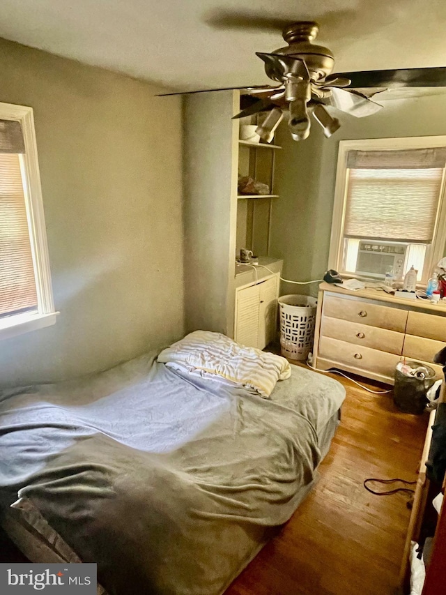 103 Willows Ave Unit 90, Norwood, PA 19074 - bedroom featuring wood finished floors, cooling unit, and ceiling fan