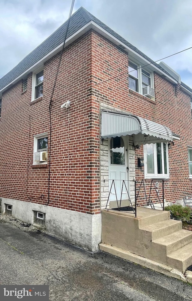 103 Willows Ave Unit 90, Norwood, PA 19074 - view of front of home featuring brick siding and cooling unit