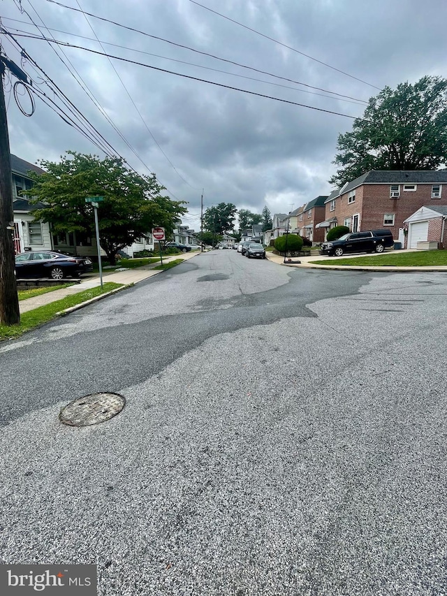 103 Willows Ave Unit 90, Norwood, PA 19074 - view of asphalt street with curbs, a residential view, sidewalks, and traffic signs