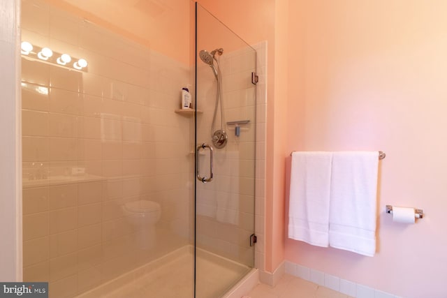 37685T Ulster Dr Unit 17, Rehoboth Beach, DE 19971 - full bathroom featuring a shower stall and tile patterned flooring