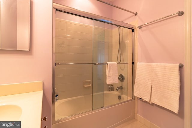 37685T Ulster Dr Unit 17, Rehoboth Beach, DE 19971 - full bathroom with vanity, bath / shower combo with glass door, and tile patterned floors