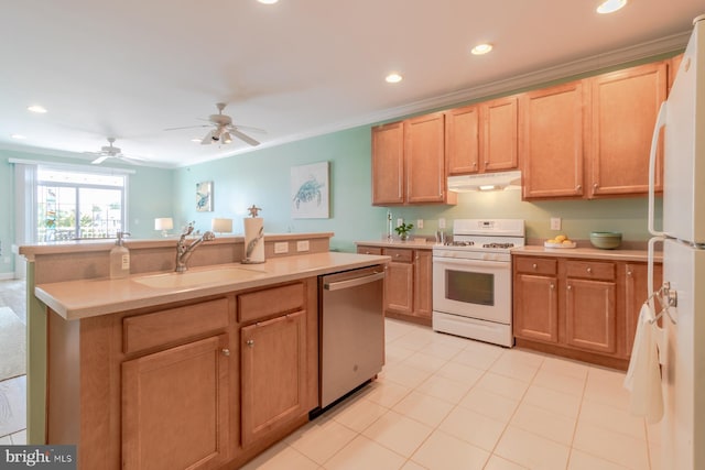37685T Ulster Dr Unit 17, Rehoboth Beach, DE 19971 - kitchen featuring white appliances, a sink, under cabinet range hood, light countertops, and recessed lighting