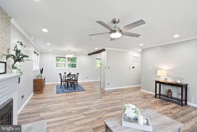 5634 Inverchapel Rd, Springfield, VA 22151 - living room with recessed lighting, crown molding, light wood-type flooring, and baseboards