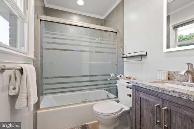 5634 Inverchapel Rd, Springfield, VA 22151 - bathroom featuring ornamental molding, toilet, vanity, and enclosed tub / shower combo