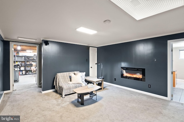5634 Inverchapel Rd, Springfield, VA 22151 - sitting room featuring a glass covered fireplace, carpet floors, crown molding, and baseboards
