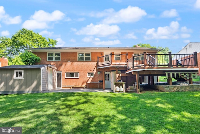 5634 Inverchapel Rd, Springfield, VA 22151 - back of property with a wooden deck, a lawn, a patio, and brick siding