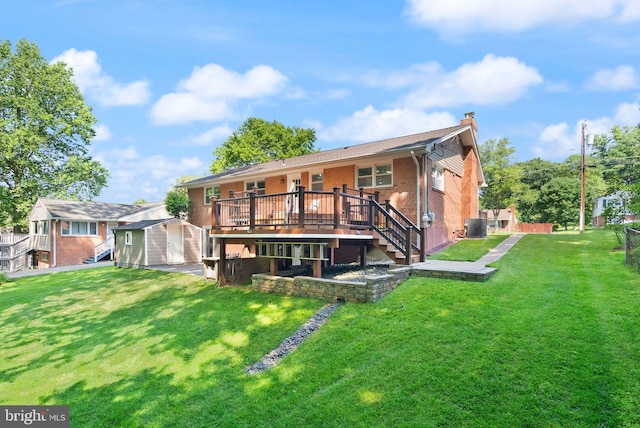 5634 Inverchapel Rd, Springfield, VA 22151 - back of property with stairs, a deck, a chimney, brick siding, and central AC