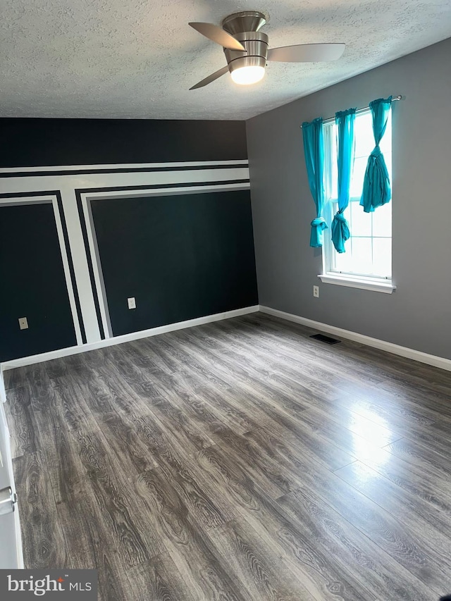 11429 Honeysuckle Ct Unit 3-3, Upper Marlboro, MD 20774 - unfurnished bedroom with a textured ceiling, wood finished floors, baseboards, and ceiling fan
