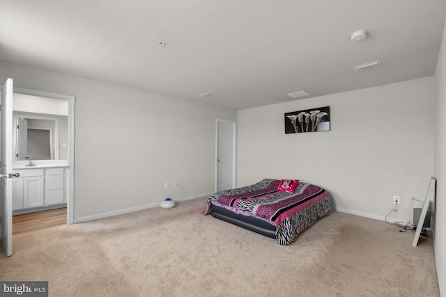 213 Pickett St, Taneytown, MD 21787 - bedroom featuring carpet flooring, baseboards, a sink, and connected bathroom