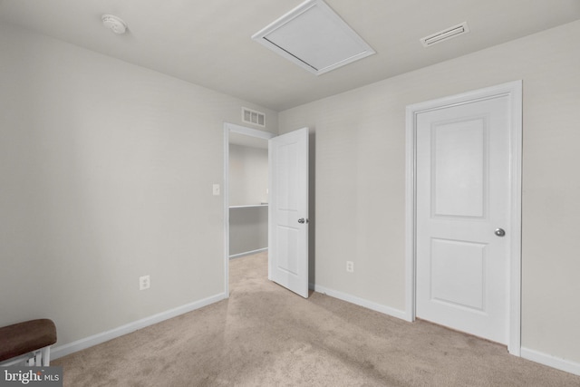 213 Pickett St, Taneytown, MD 21787 - unfurnished bedroom featuring carpet floors, baseboards, and attic access