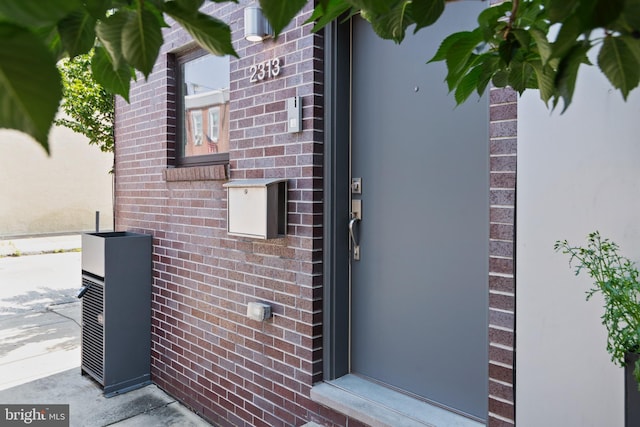 2313 Tulip St, Philadelphia, PA 19125 - property entrance with brick siding