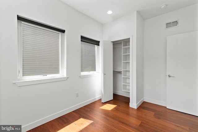 2313 Tulip St, Philadelphia, PA 19125 - unfurnished bedroom featuring baseboards, wood finished floors, a closet, and recessed lighting