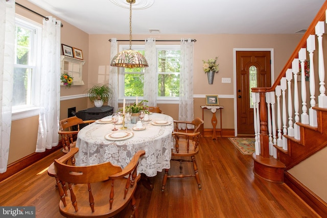 312 E 7th Ave, Trappe, PA 19426 - dining space with stairway, wood finished floors, and baseboards