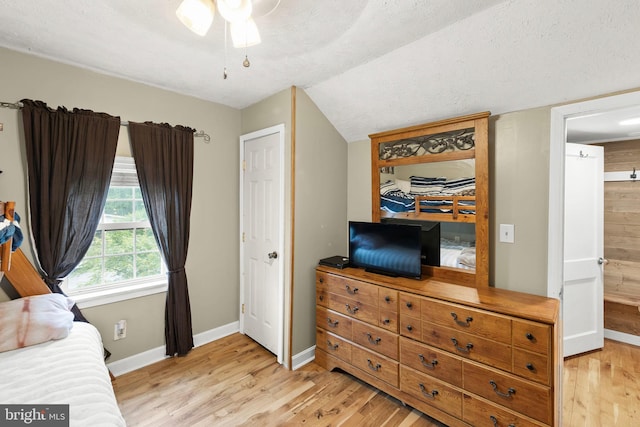 171 Sinking Spring Ln, Gore, VA 22637 - bedroom featuring light wood-style flooring and lofted ceiling