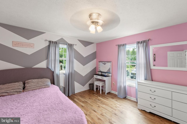 171 Sinking Spring Ln, Gore, VA 22637 - bedroom featuring wood finished floors and a ceiling fan