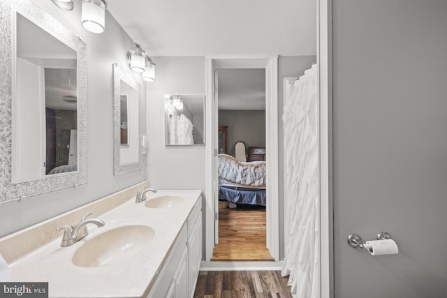 171 Sinking Spring Ln, Gore, VA 22637 - ensuite bathroom featuring wood finished floors and double vanity