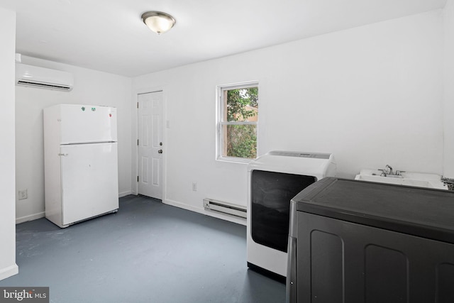 3545 Emerald St, Philadelphia, PA 19134 - washroom with washer / clothes dryer, a baseboard radiator, a wall mounted air conditioner, and baseboards