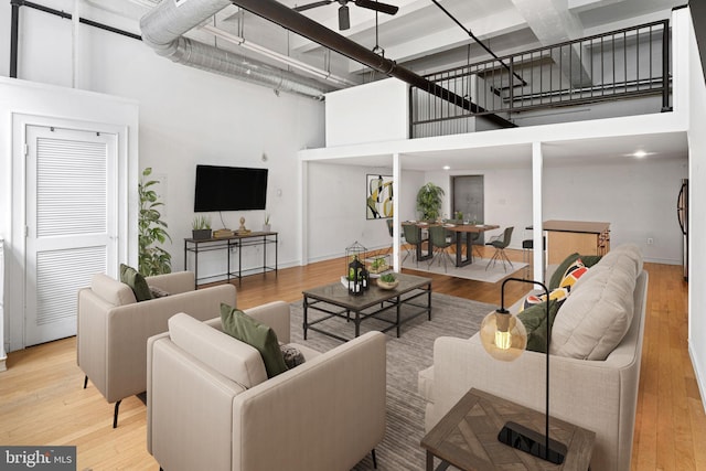 810 N Hancock St Unit 2, Philadelphia, PA 19123 - living room with a high ceiling and wood finished floors