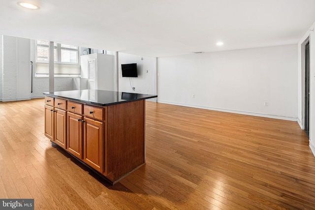 810 N Hancock St Unit 2, Philadelphia, PA 19123 - kitchen featuring light wood finished floors, open floor plan, brown cabinetry, a kitchen island, and recessed lighting