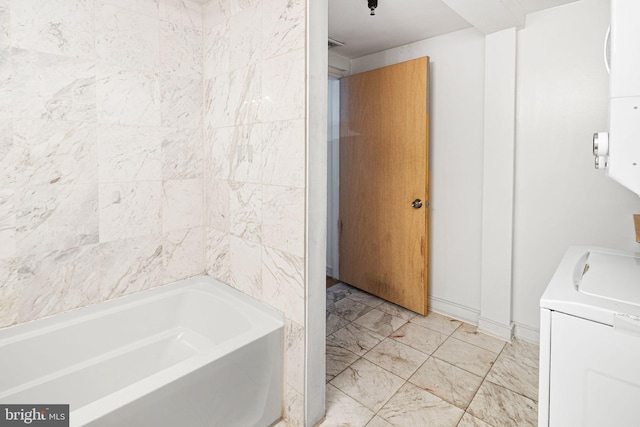 810 N Hancock St Unit 2, Philadelphia, PA 19123 - full bath featuring washer / clothes dryer, a bath, vanity, and marble finish floors