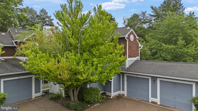 8 Railroad Pl, Pennington, NJ 08534 - obstructed view of property with roof with shingles