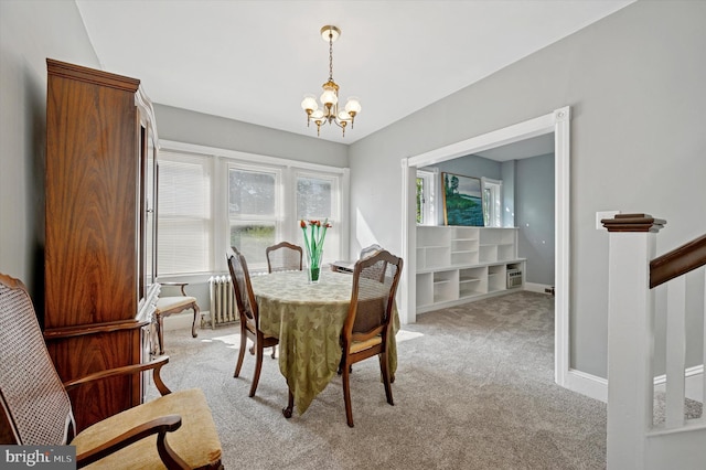1865 Marshall, Norristown, PA 19403 - dining space featuring a chandelier, light colored carpet, radiator heating unit, and baseboards