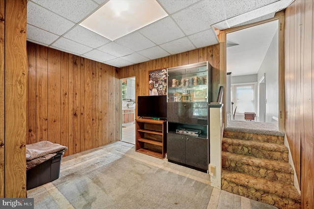 1865 Marshall, Norristown, PA 19403 - bar area featuring carpet floors, wooden walls, and stairway