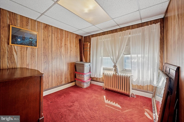 1865 Marshall, Norristown, PA 19403 - bedroom featuring radiator, a paneled ceiling, wooden walls, carpet flooring, and baseboards