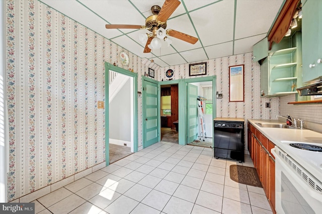 1865 Marshall, Norristown, PA 19403 - kitchen featuring dishwasher, a sink, wallpapered walls, light tile patterned floors, and open shelves